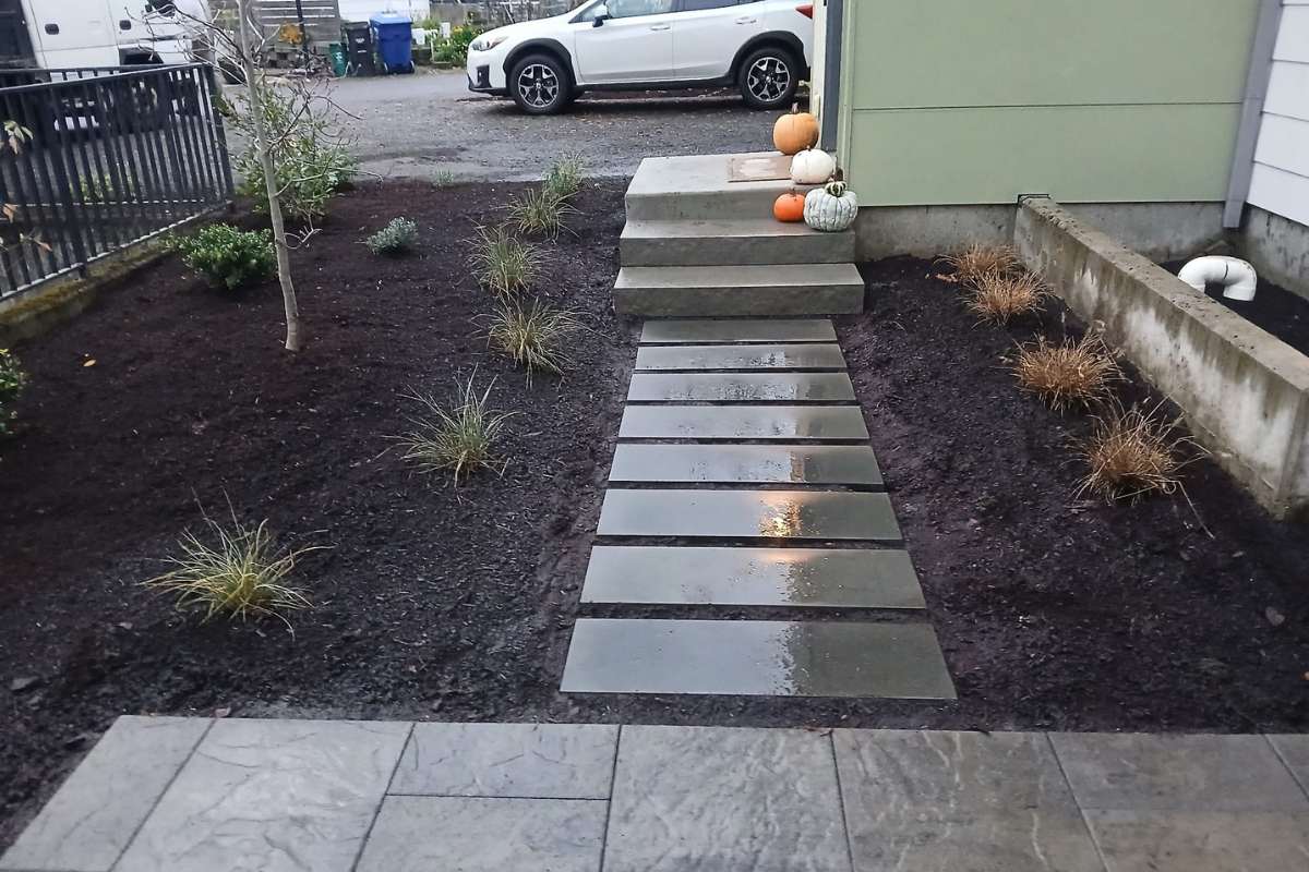 permeable paver pathway replacing lawn Seattle