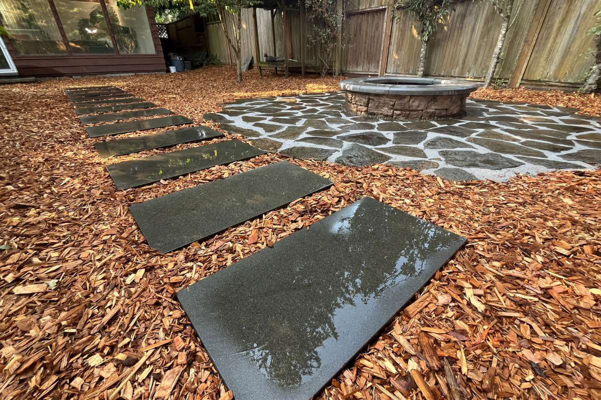 permeable paver pathway replacing lawn Seattle