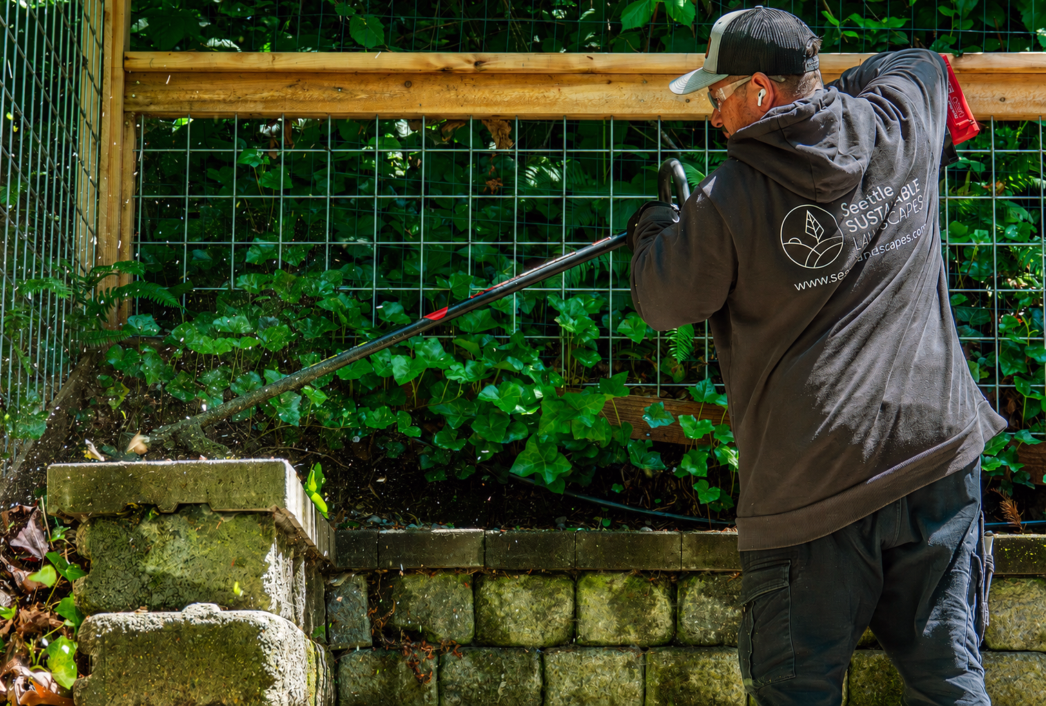 Crew performing sustainable landscaping with battery landscaping tools