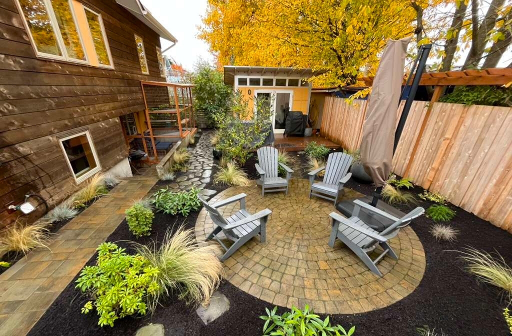 Circle patio and chairs in a fall landscape