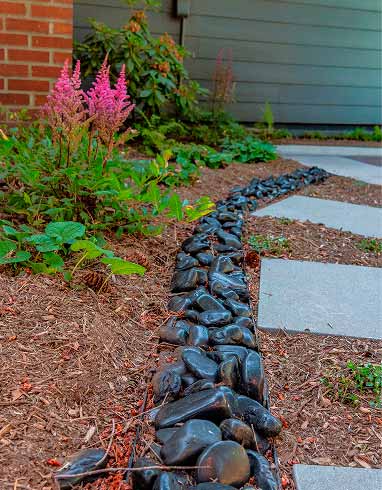 Corten steel with decorative pebbles
