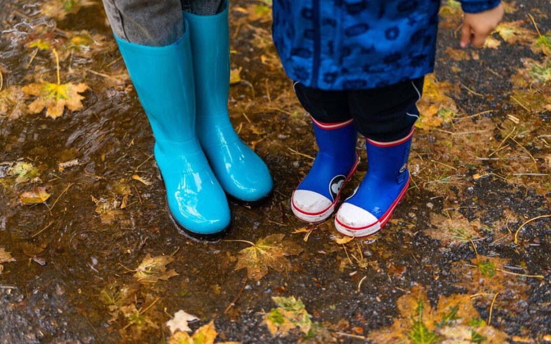 Kids playing in a rain garden in a Seattle yard